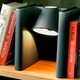 Illustration for article titled Clever Bookend Lamp Hides Between Hemingway and Shakespeare